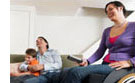 Family watching a television